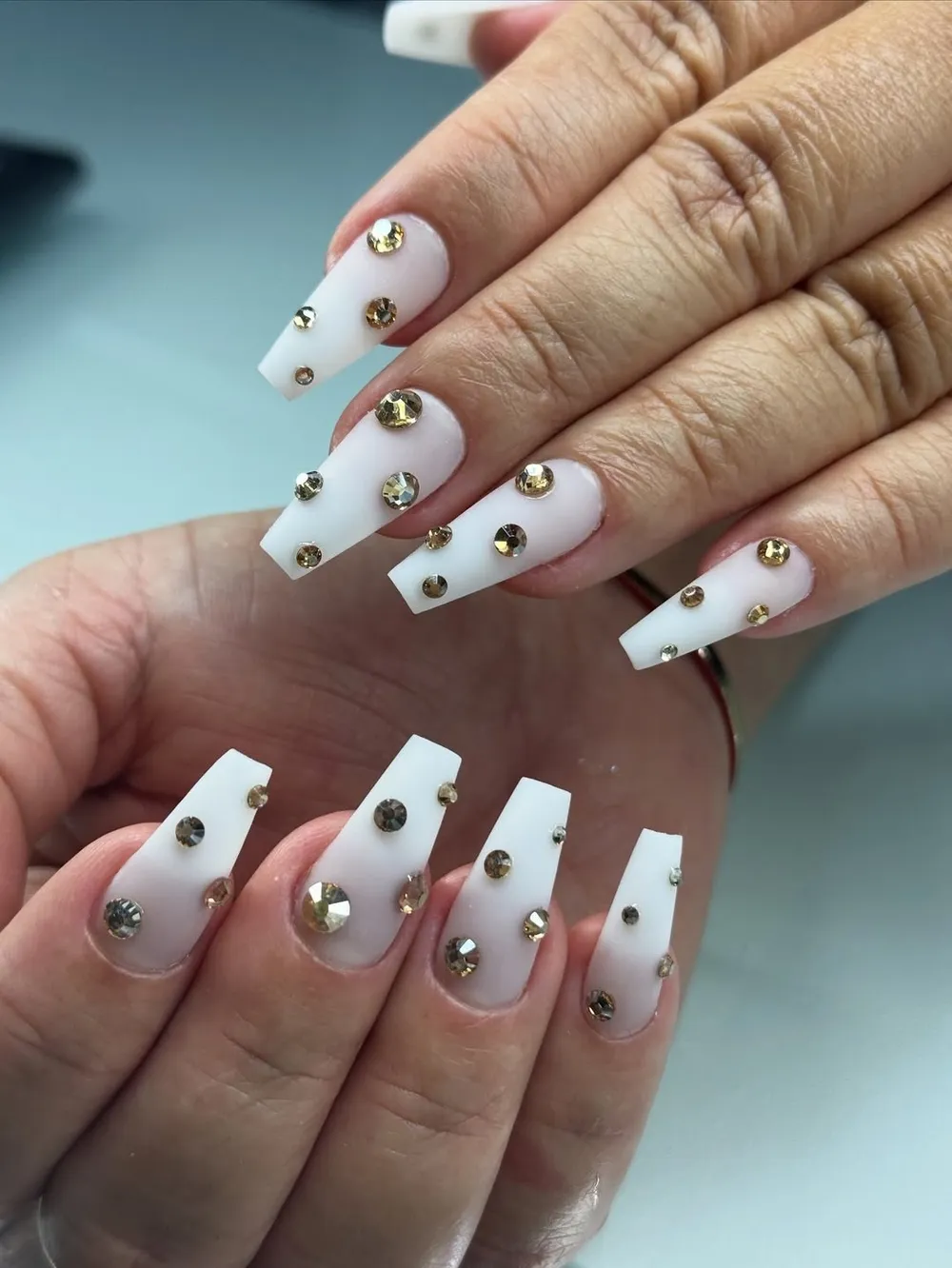 White coffin nails with gold rhinestones by BeautyFusionClau